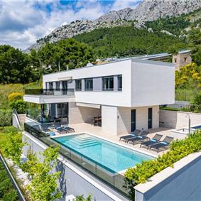 5 bedroom beachfront villa with heated pool near Omis, sleeps 9